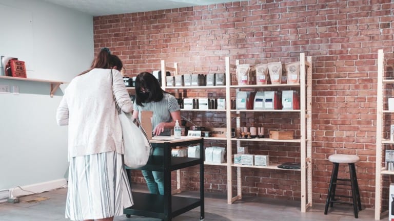 Customer paying for coffee at cashier
